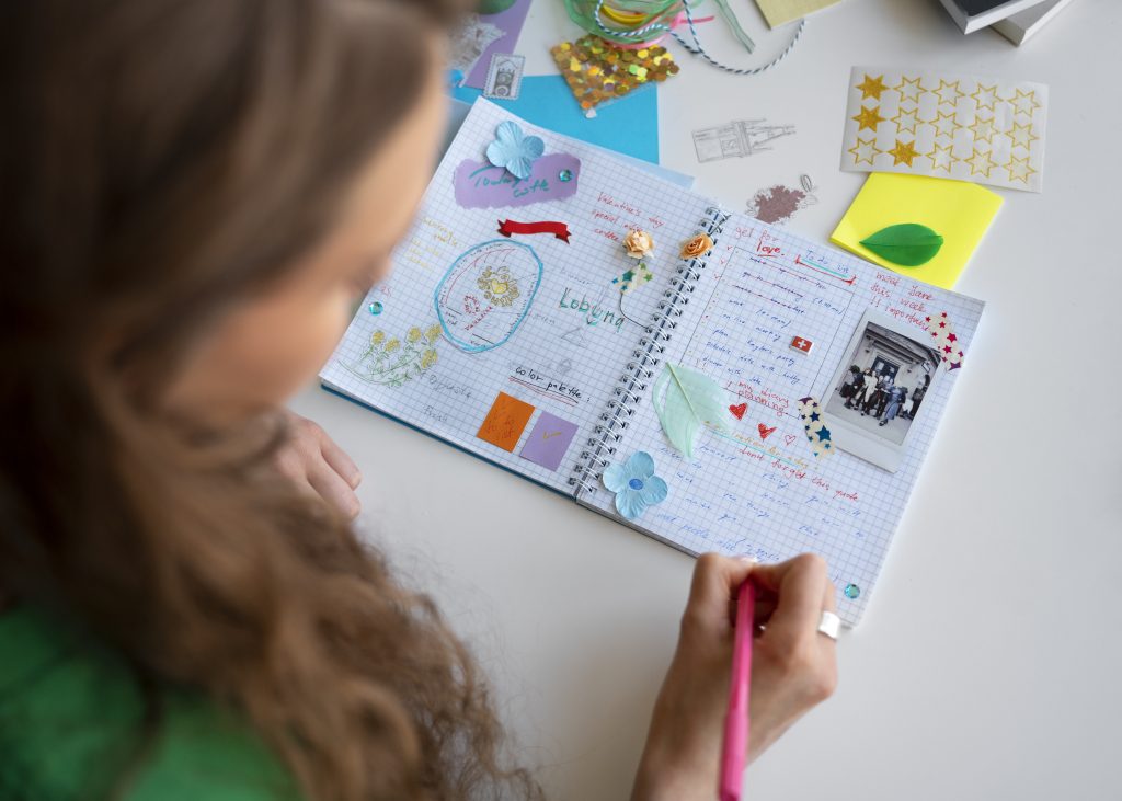 Teen works in a planner, good executive functioning