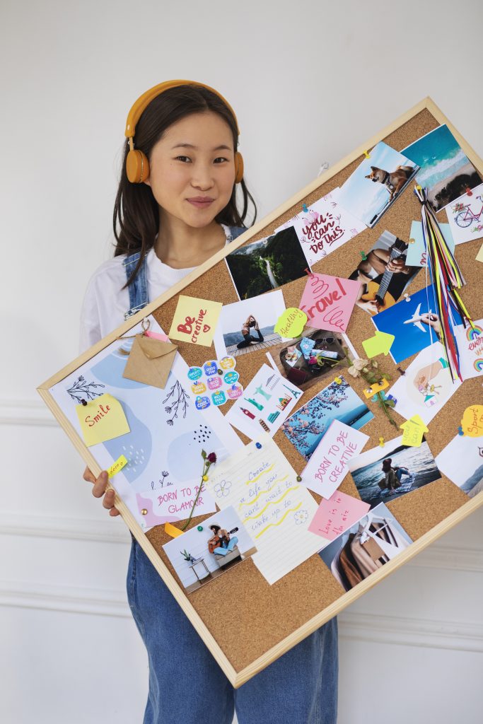 Girl displays vision board