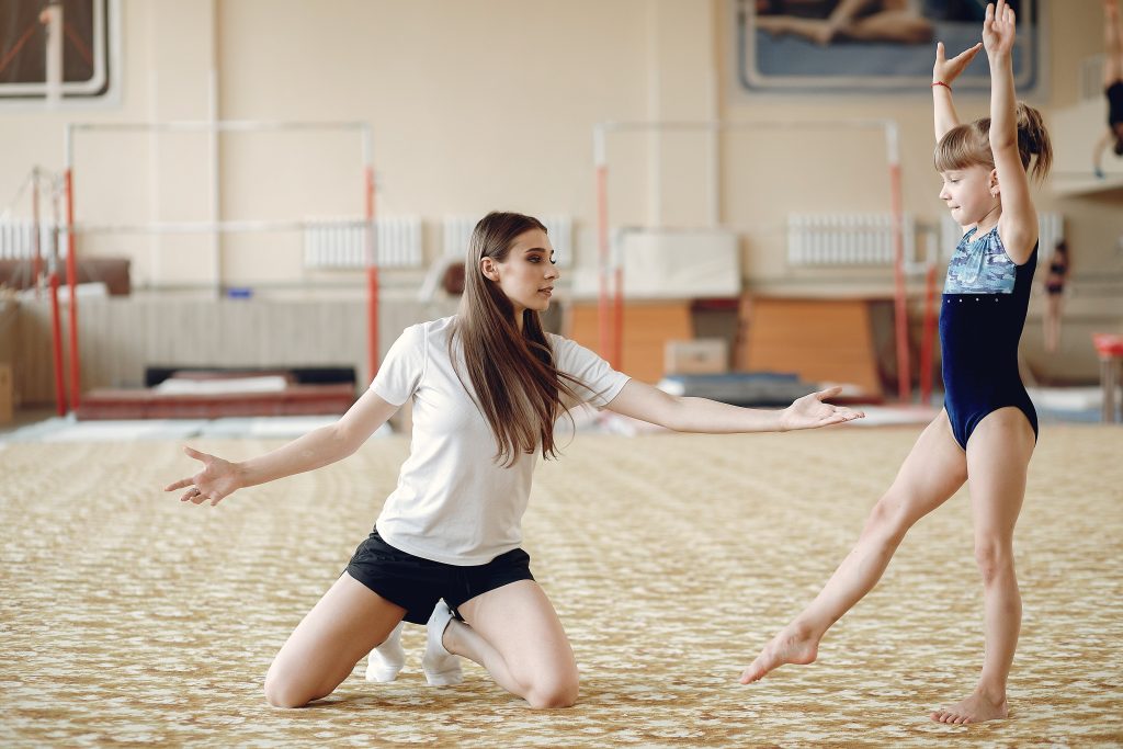 Reasons to homeschool: a girl takes gymnastics class during the day